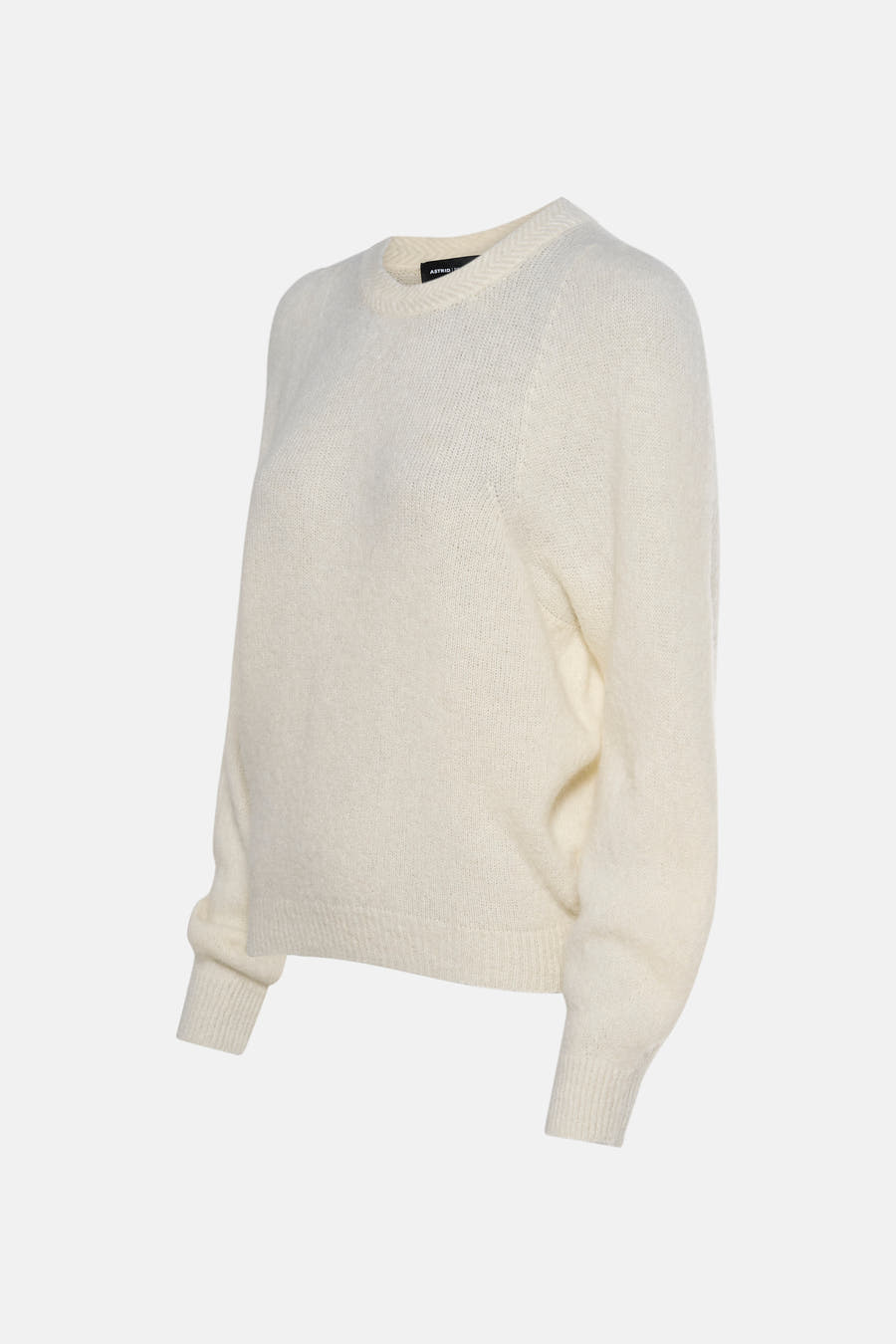 T-shirt écru avec col rond d'Astrid Black Label, avec longues manches et une douce texture.