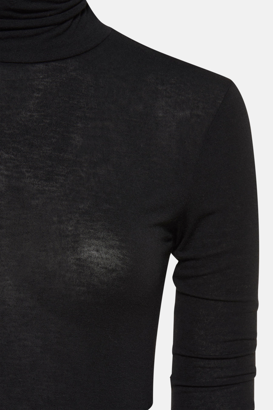 T-shirt noir à manches longues d'Astrid Black Label, gros plan du tissu.