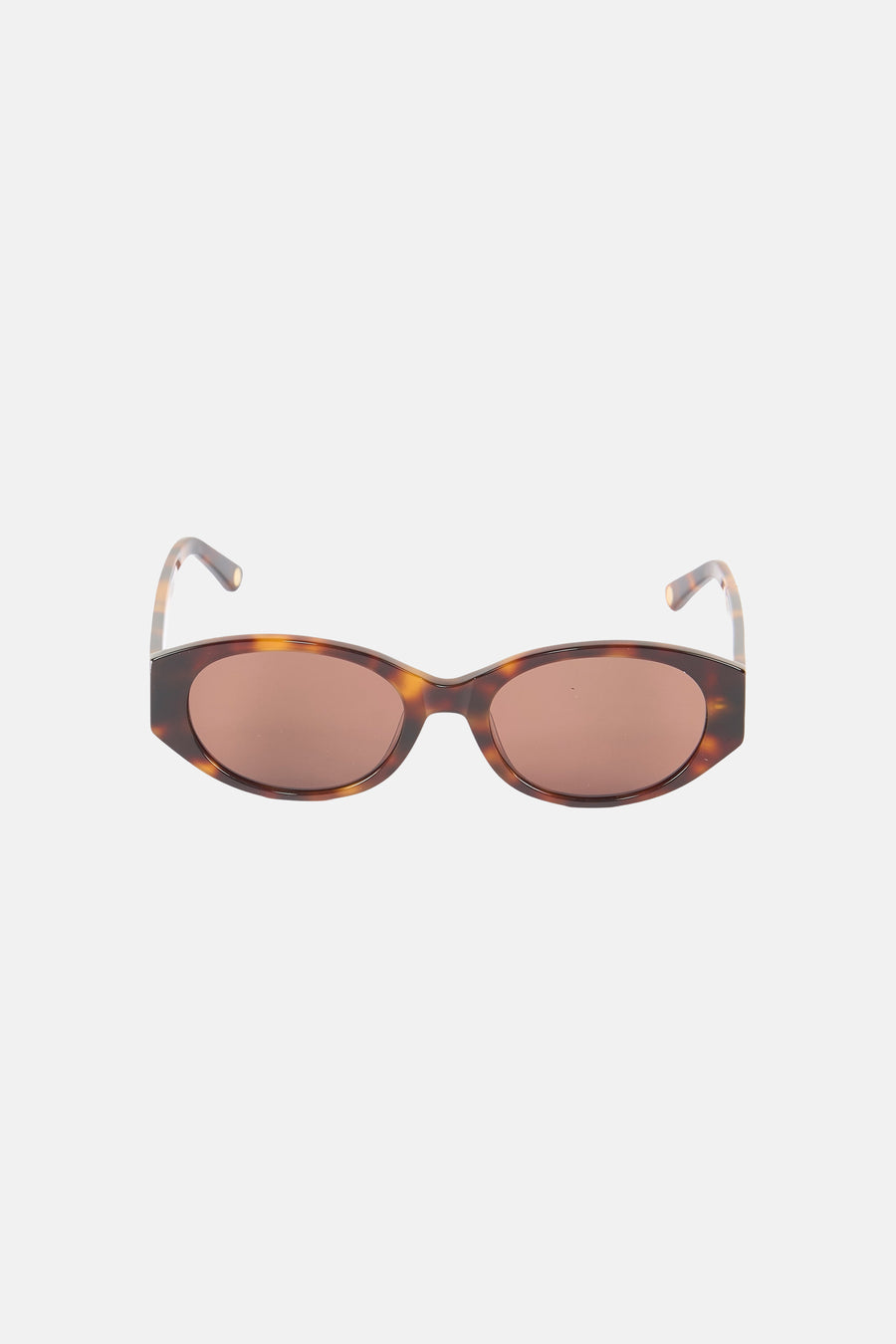 Lunettes à monture marron Astrid Black Label, avec un motif écaille de tortue.