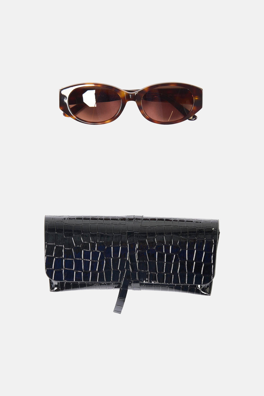 Lunettes marron Astrid Black Label avec une monture de lunettes de soleil.