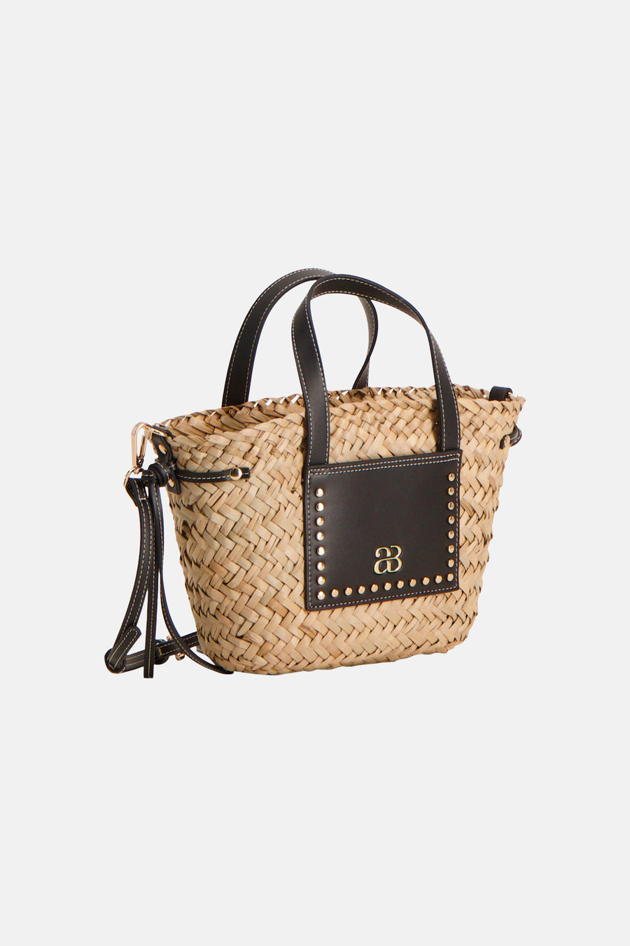 Sac à bandoulière beige Astrid Black Label avec détails tressés, accents en cuir noir et clous dorés.