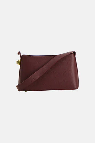 Sac à bandoulière Bordeaux d'Astrid Black Label, avec détails dorés et une subtile texture grainée.