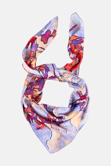 Châle d'été multicolore Astrid Black Label avec motif floral abstrait en tons de rouge, violet et jaune.