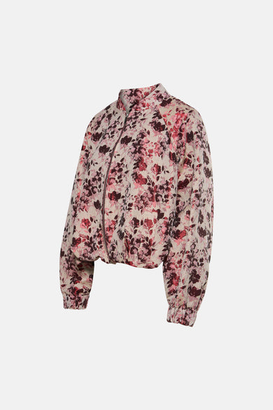Manteau rose Astrid Black Label avec motif floral et fermeture éclair.