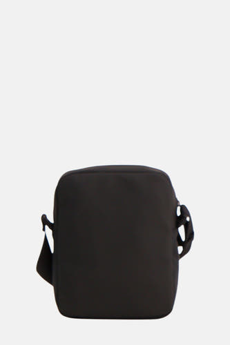 Sac à dos noir de TOMMY JEANS, avec une sangle d'épaule ajustable et un design simple.