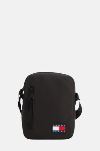 Sac à dos noir de TOMMY JEANS, avec logo et poche avant à fermeture éclair.