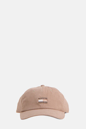 Chapeau beige de TOMMY JEANS avec texture en corduroy et logo de la marque sur l'avant.