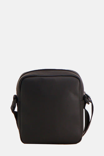 Sac à dos noir de TOMMY JEANS avec une sangle d'épaule réglable.