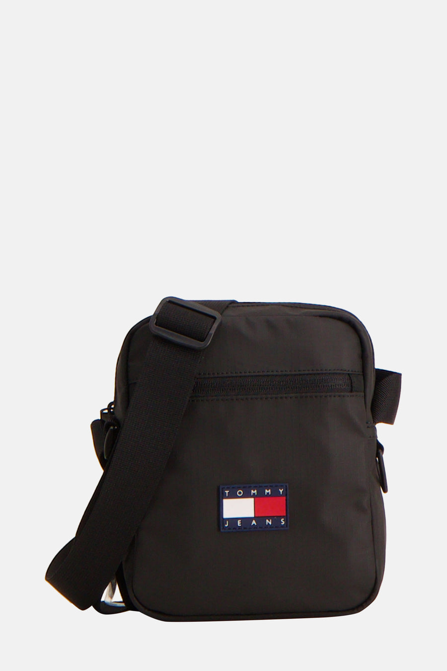 Sac à dos noir de TOMMY JEANS, avec une sangle ajustable et un design simple.