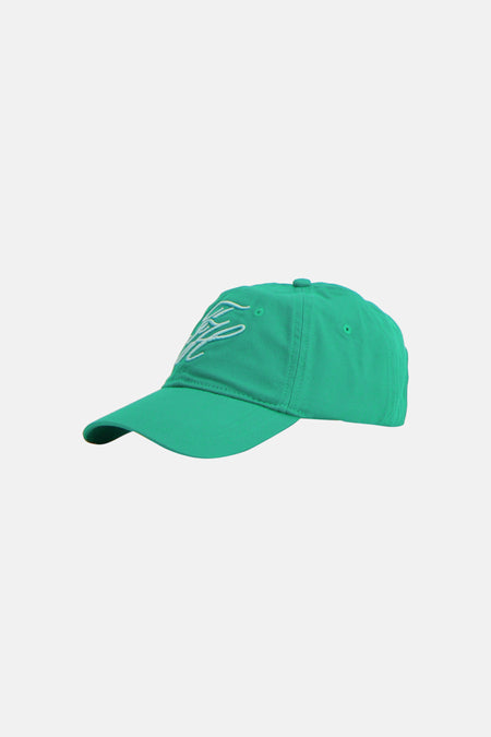 Groene pet van TOMMY JEANS met wit geborduurd logo, zij-aanzicht.