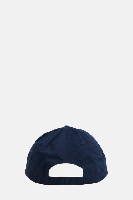 Casquette bleue de TOMMY JEANS, avec une bande ajustable à l'arrière et des trous de ventilation.