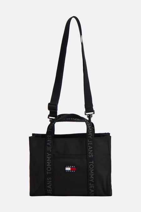 Sac à dos noir de Tommy Jeans avec bandes logo et une bandoulière.