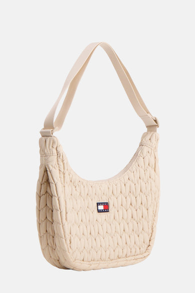Sac bandoulière écru de Tommy Jeans avec motif de visière doublé et badge logo.