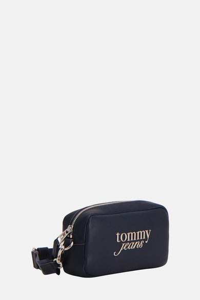 Sac à dos bleu de TOMMY JEANS, avec fermeture éclair argentée et bandoulière ajustable.