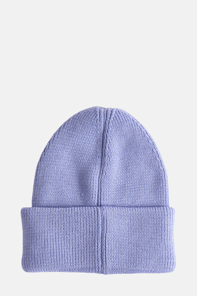 Casquette bleue claire de TOMMY JEANS, avec une texture finement tissée et un bord replié.
