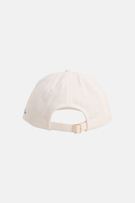 Gebroken witte pet van TOMMY JEANS, met verstelbare band, goudkleurige gesp en een geborduurd logo aan de zijkant, achteraanzicht.