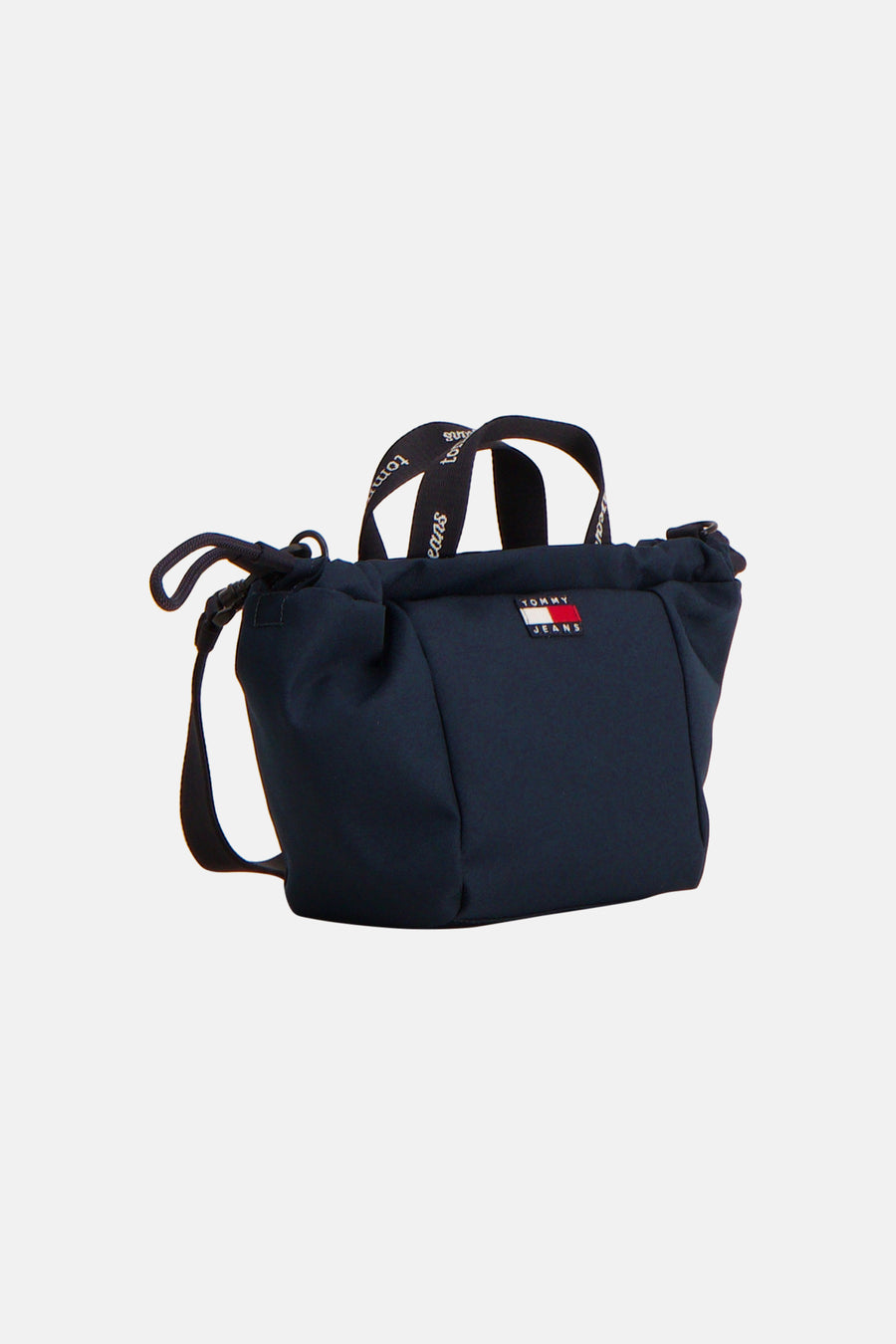 Donkerblauwe handtas van TOMMY JEANS met logo-patch, brede handvatten en schouderband, front view