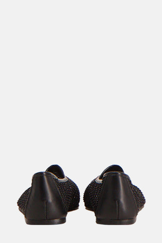 Zwarte damesschoenen met strass en leren hiel.