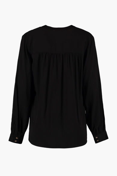 Blouse noire à manches longues de HAILYS, dos avec volants et boutons aux poignets