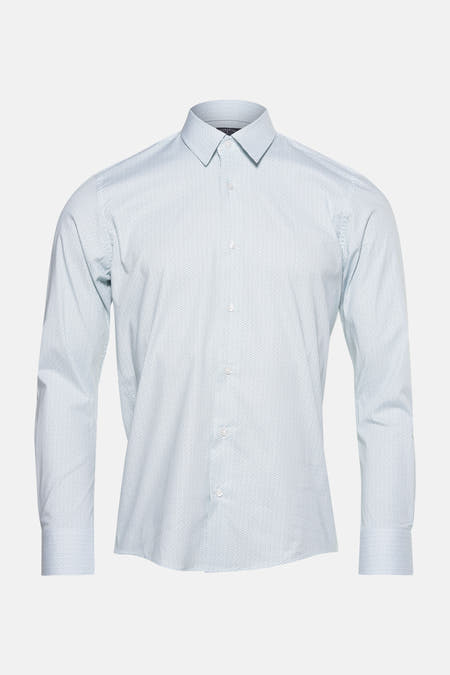 Chemise verte à manches longues de Bruce & Butler, avec un motif subtil et des boutons blancs.