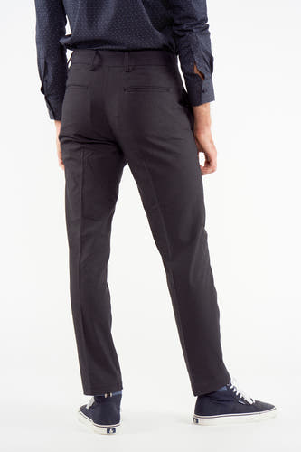 Pantalon de costume bleu foncé de Bruce & Butler avec motif à carreaux subtil, dos visible.