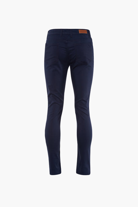 Pantalon bleu de Bruce & Butler, couleur unie avec des poches arrière, vu de l'arrière.