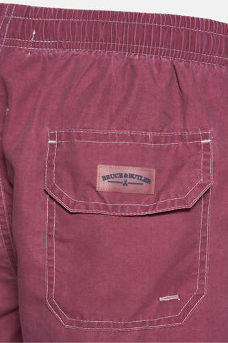 Bordeaux zwemshort van Bruce & Butler, met een opgestikte zak en elastische tailleband.
