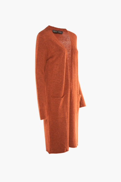 Gilet orange de COPINES D'ANVERS, avec des manches longues et des poches, sur un fond blanc.