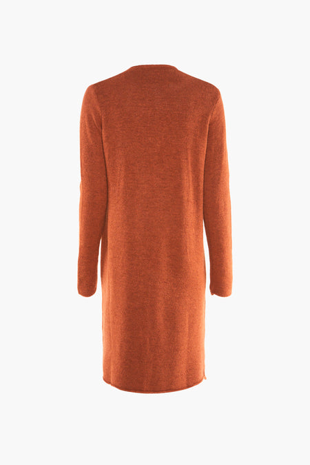 Gilet orange de COPINES D'ANVERS, texture tricotée, longues manches et design simple.