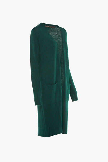Gilet vert de COPINES D'ANVERS, avec des manches longues et des poches, sur un fond blanc.