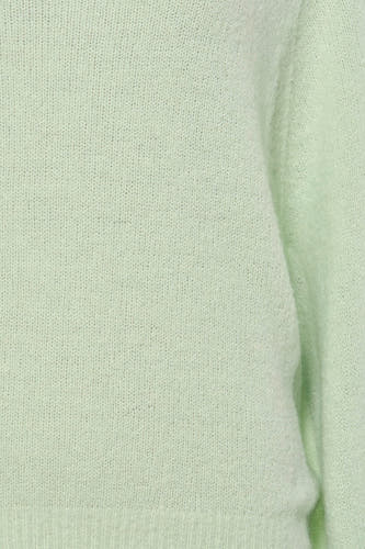 Pull vert clair à col rond de Clouds of Fashion avec une structure en maille fine et duveteuse et un ourlet côtelé.