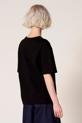 Zwart T-shirt met korte mouwen van Clouds of Fashion, met een effen dessin, gezien vanaf de achterkant.