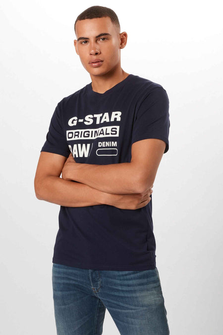 T-shirt bleu marine en denim de G-Star RAW, avec manches courtes et un imprimé sur l'avant.
