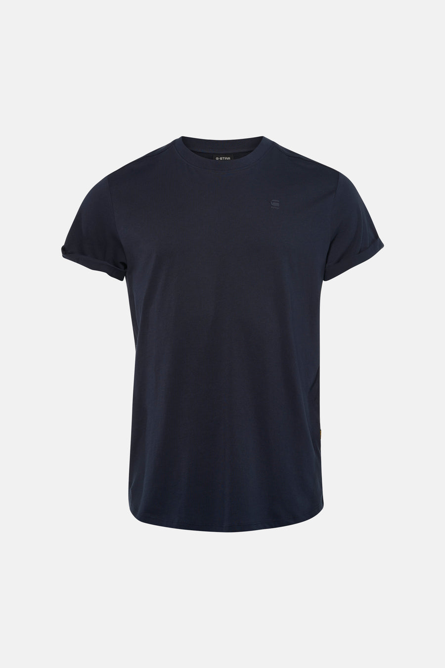 T-shirt bleu à manches courtes de G-Star RAW, combiné avec un jean bleu clair et des baskets grises.