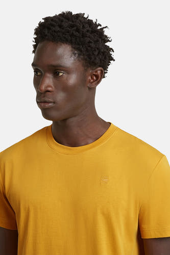 T-shirt jaune à manches courtes de G-Star RAW, couleur unie avec petit logo sur la poitrine.