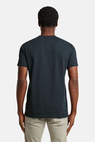 Blauw T-shirt met korte mouwen van G-Star RAW, gezien van achteren, gedragen met een beige broek.
