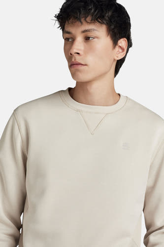 Ecru sweater met ronde hals van G-Star RAW, met een kleine logo op de borst.