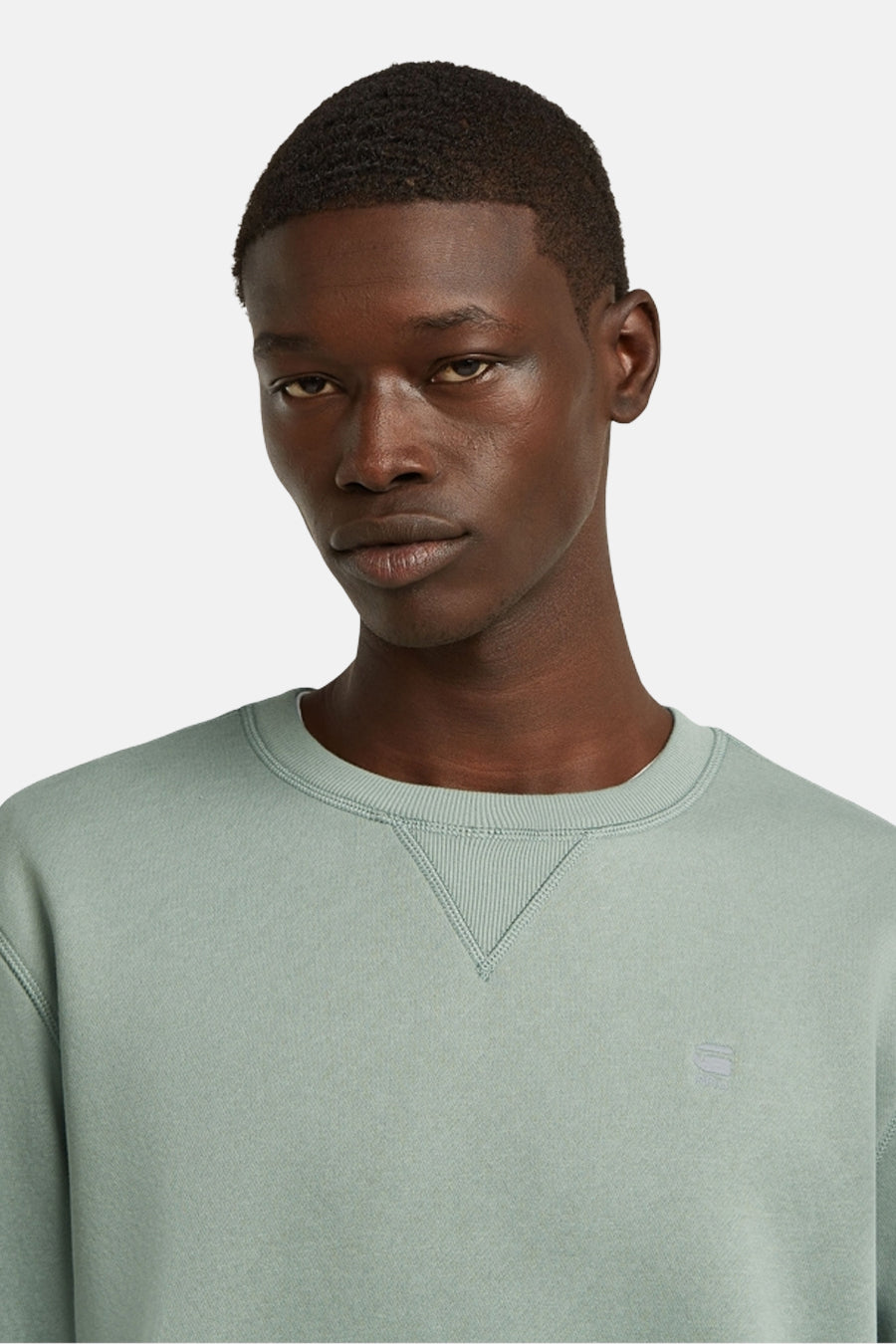 Sweater vert de G-Star RAW, avec une encolure ronde et un petit logo sur la poitrine.