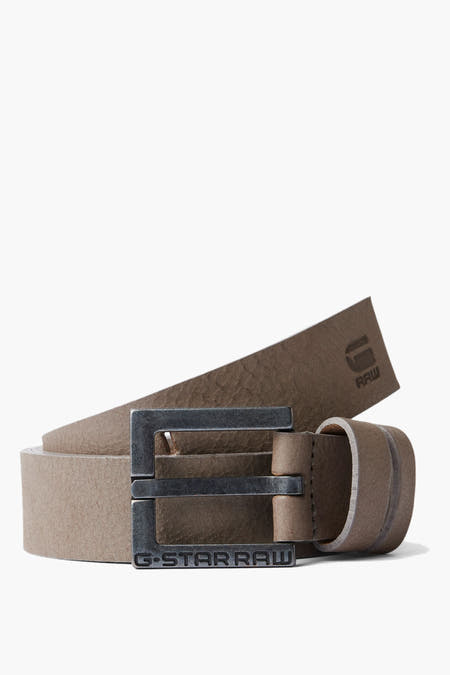 Ceinture grise de G-Star RAW avec une texture grossière et une boucle argentée au logo de la marque.