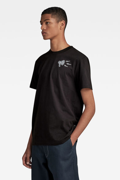 T-shirt noir à manches courtes de G-Star RAW avec impression mégaphone blanche sur la poitrine, modèle de profil