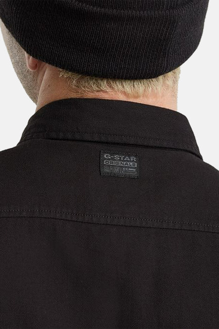 Chemise grise à longues manches de G-Star RAW, détail de l'arrière avec une patch noire.