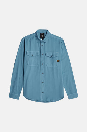 Chemise bleue à manches longues de G-Star RAW, avec deux poches po torse et col boutonné.