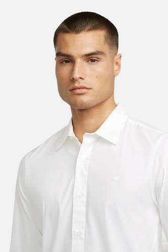 Chemise blanche à manches longues de G-Star RAW, avec col boutonné et logo subtil sur la poitrine.