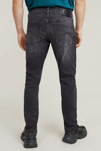 Jean slim fit en denim gris foncé de G-Star RAW, vu de l'arrière, associé à des chaussures noires.
