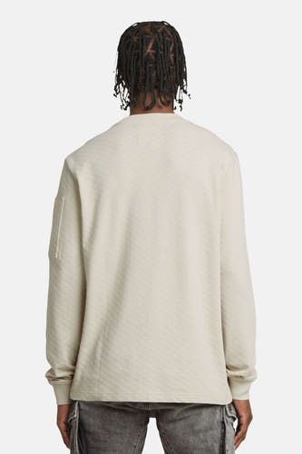 Gilet écru avec col rond de G-Star RAW, avec une subtile texture tweed et un poche sur la manche, vu de derrière.