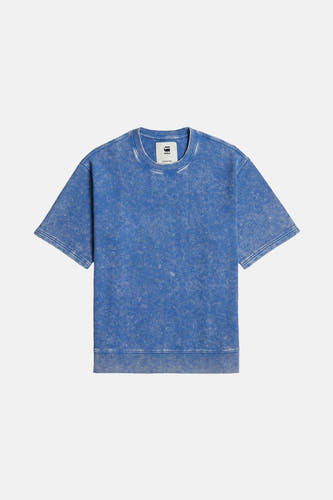 Pull-over bleu de G-Star RAW, avec une texture froissée et des manches courtes.