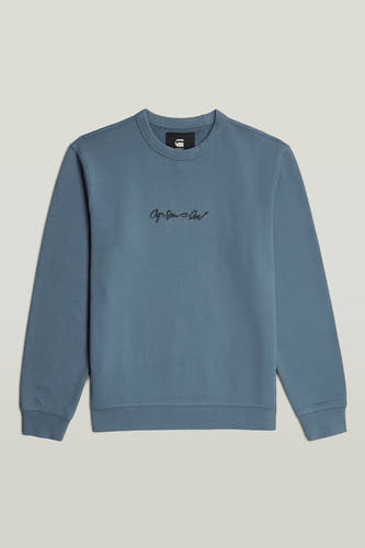 Blauwe sweater van G-Star RAW, met een ronde hals en een subtiel logo op de borst.