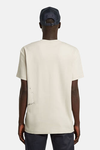 T-shirt écru à manches courtes de G-Star RAW, avec un détail d'impression sur le côté et sinon un design lisse.