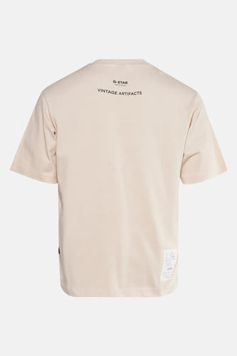 T-shirt écru à manches courtes de G-Star RAW, avec un imprimé sur le dos et une étiquette en bas.