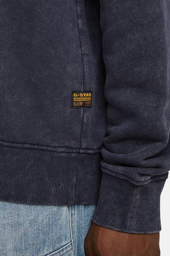 Pull-over bleu de G-Star RAW, avec des bordures côtelées et un lavage vintage.